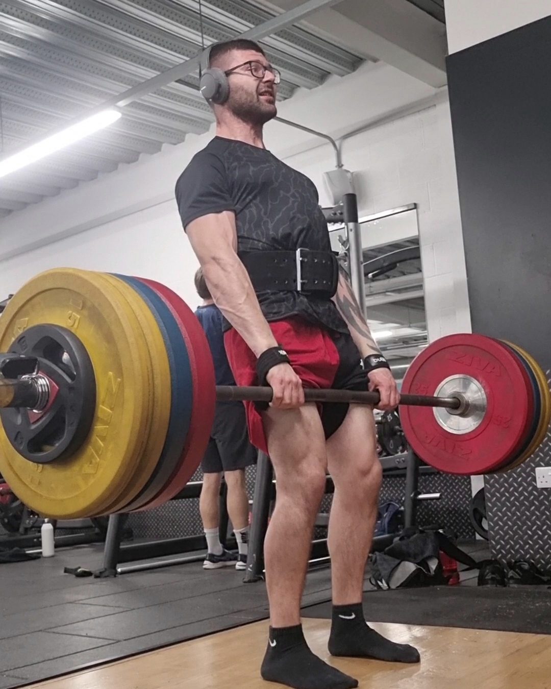 Chris Cachia performing a heavy barbell deadlift at PureGym Banbury